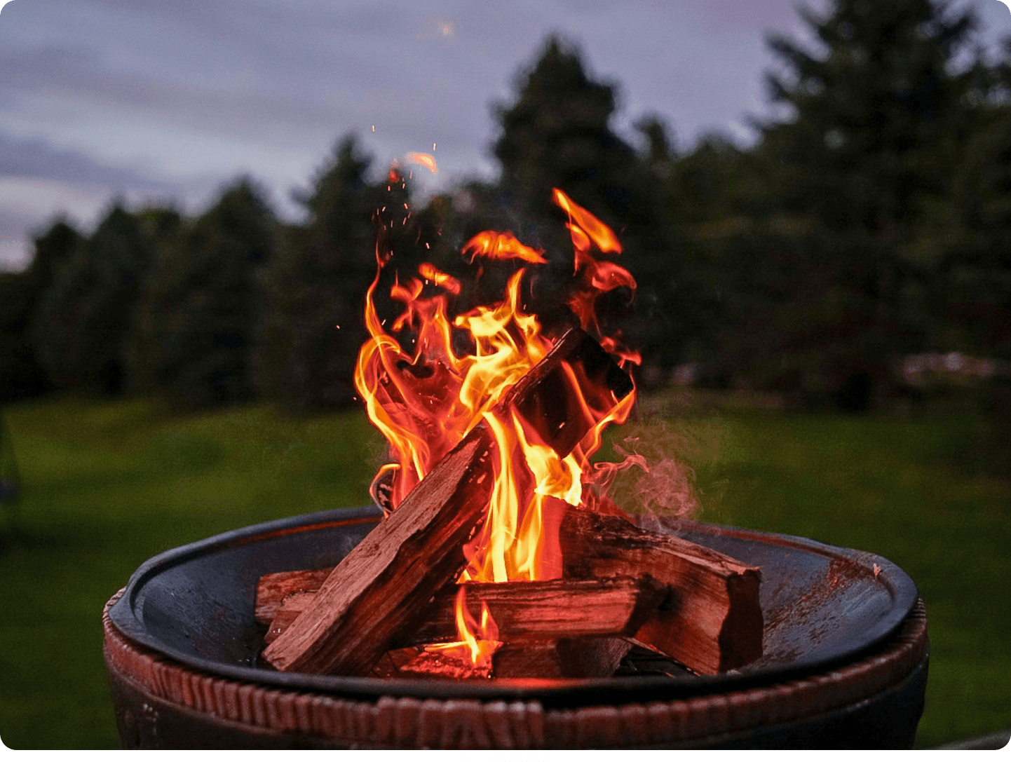 Campsite with evening campfire illustrating vacation liability coverage scenarios